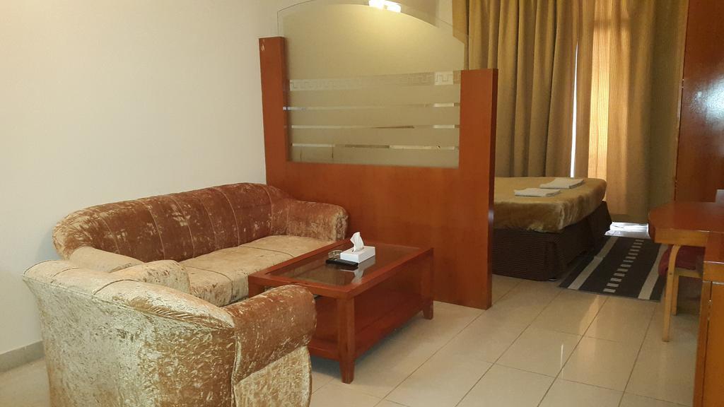 Al Raien Hotel Apartment Дубай Стая снимка