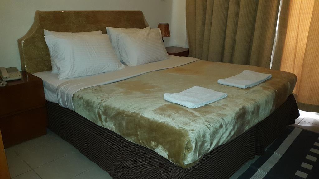 Al Raien Hotel Apartment Дубай Стая снимка