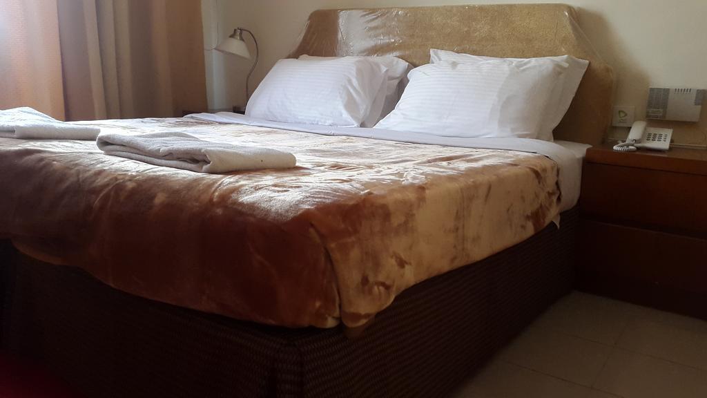 Al Raien Hotel Apartment Дубай Стая снимка