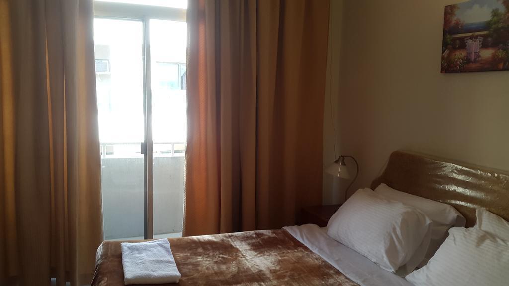 Al Raien Hotel Apartment Дубай Стая снимка